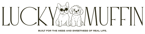 Logo of Lucky Muffin with two dogs and text about real life.